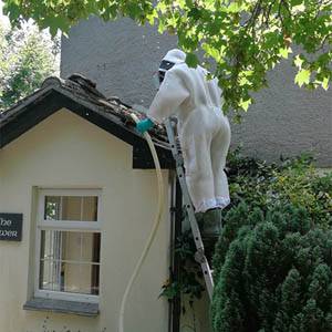 wearing a safety suit on a roof